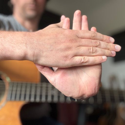 guitar finger pain stretch